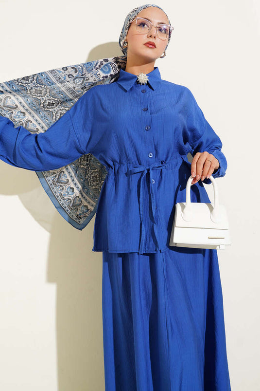 Costume deux pièces à jupe taille tunnel chez Saks