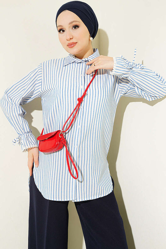 Chemise Rayée Bleue À Biais De Cheville