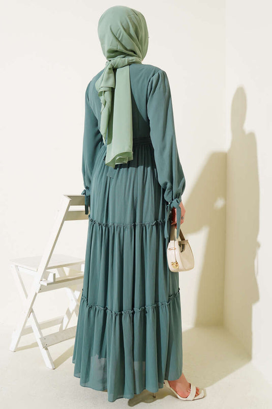 Robe à volants vert sauge avec nœud aux chevilles