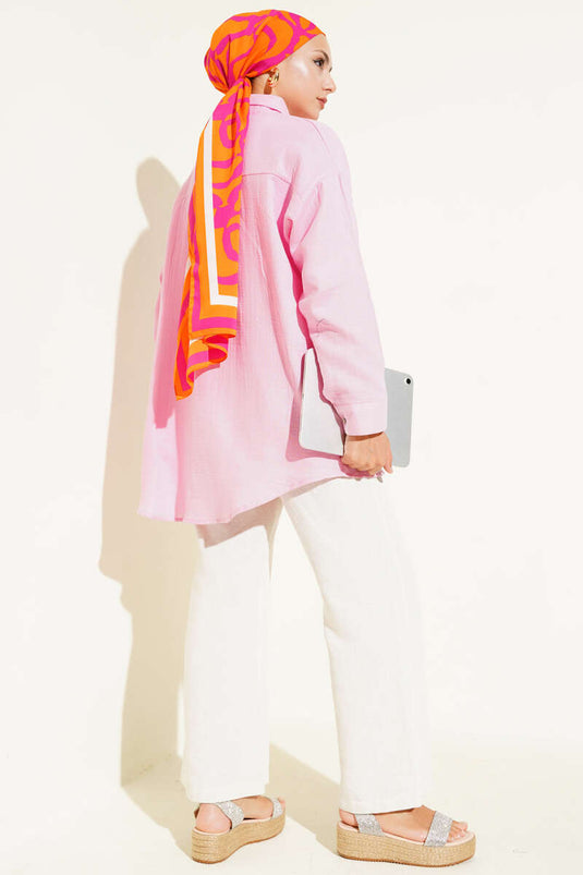 قميص أساسي بأزرار عند الكاحل، وردي