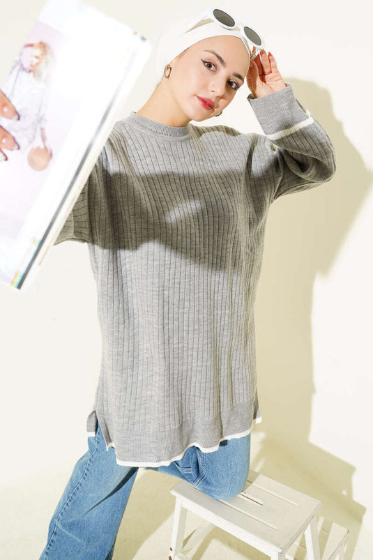 سترة محبوكة مضلعة بأزرار على الأكمام، رمادية