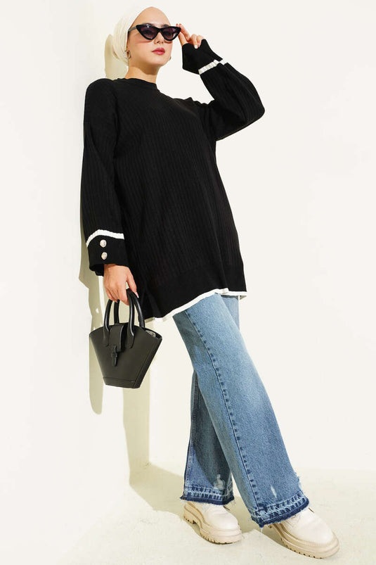 سترة محبوكة مضلعة بأزرار على الأكمام، سوداء