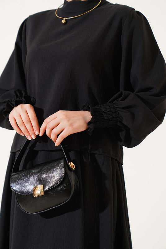 طقم من قطعتين مع تنورة بطول الكاحل وأسود