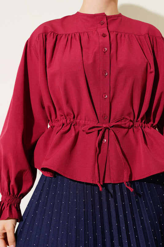 قميص قصير بخصر مطاطي باللون الأحمر الداكن