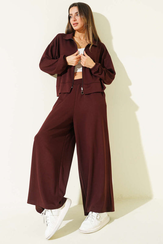 Locker sitzendes zweiteiliges Set mit elastischem Handgelenksbund und Taschen, braun