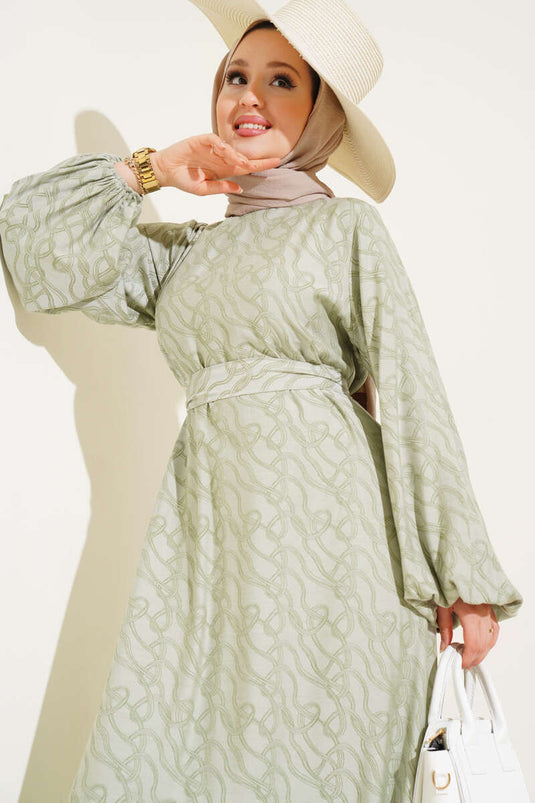 فستان بنمط عقدة كاحل مطاطية باللون الأخضر اللوزي