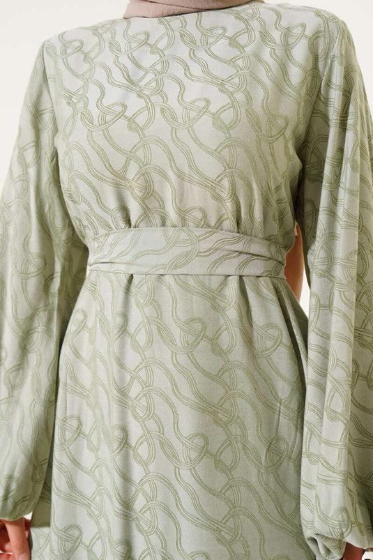 فستان بنمط عقدة كاحل مطاطية باللون الأخضر اللوزي