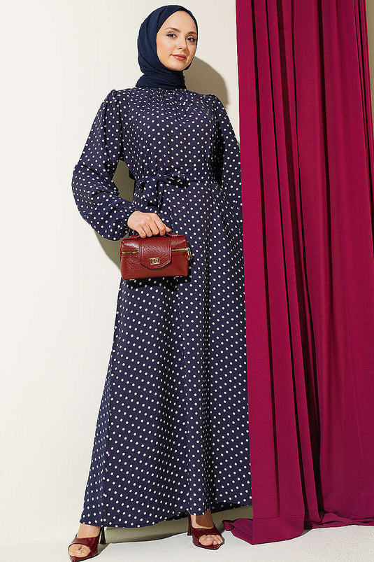 Robe à pois avec ceinture élastique aux poignets bleu marine