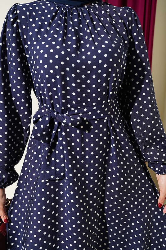 Robe à pois avec ceinture élastique aux poignets bleu marine