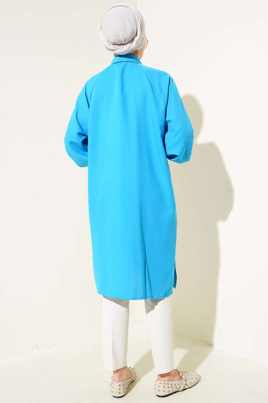 Chemise longue côtelée bleue à chevilles