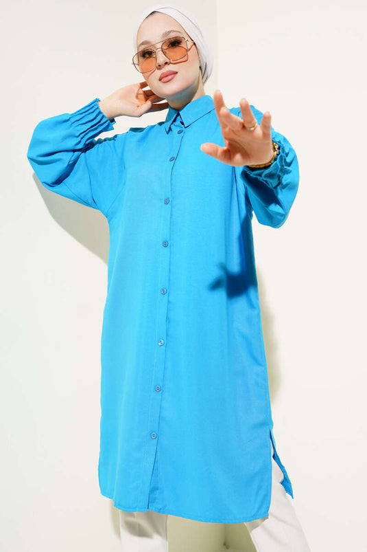 Chemise longue côtelée bleue à chevilles