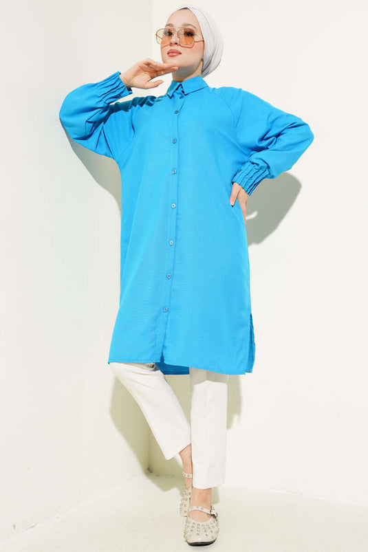 Chemise longue côtelée bleue à chevilles