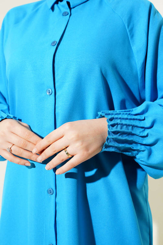 Chemise longue côtelée bleue à chevilles