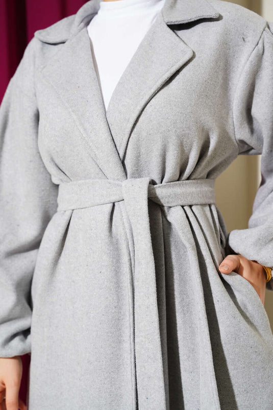 Manteau en cachemire gris avec poignets élastiques