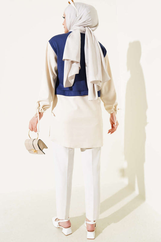 Tunique à chevilles tunnelées et garniture bleu marine