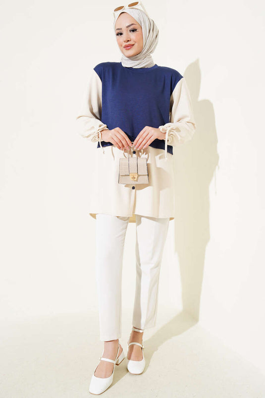 Tunique à chevilles tunnelées et garniture bleu marine