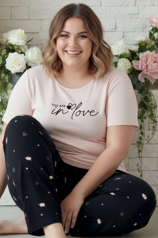 طقم بيجامة كبير الحجم بطبعة وياقة دائرية بلون برتقالي فاتح