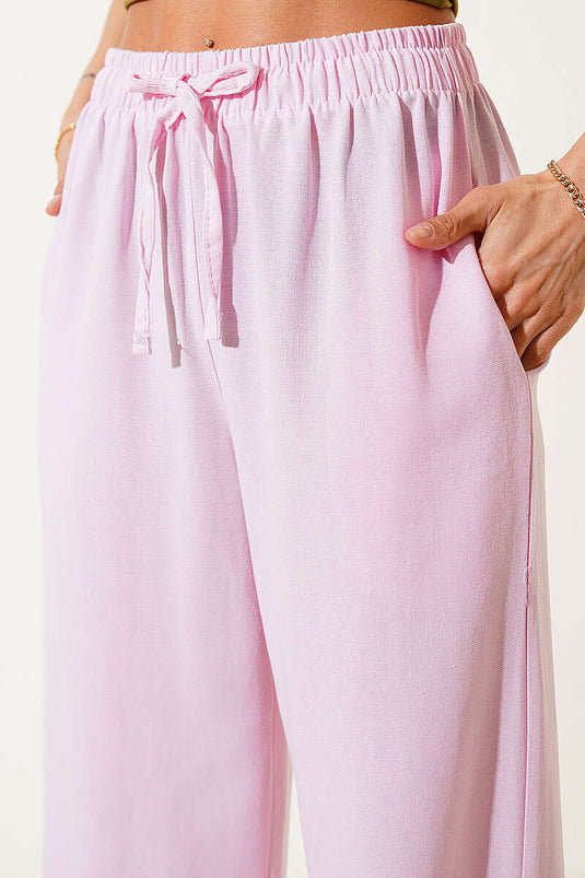 Pantalon en lin rose à taille élastique et jambes larges