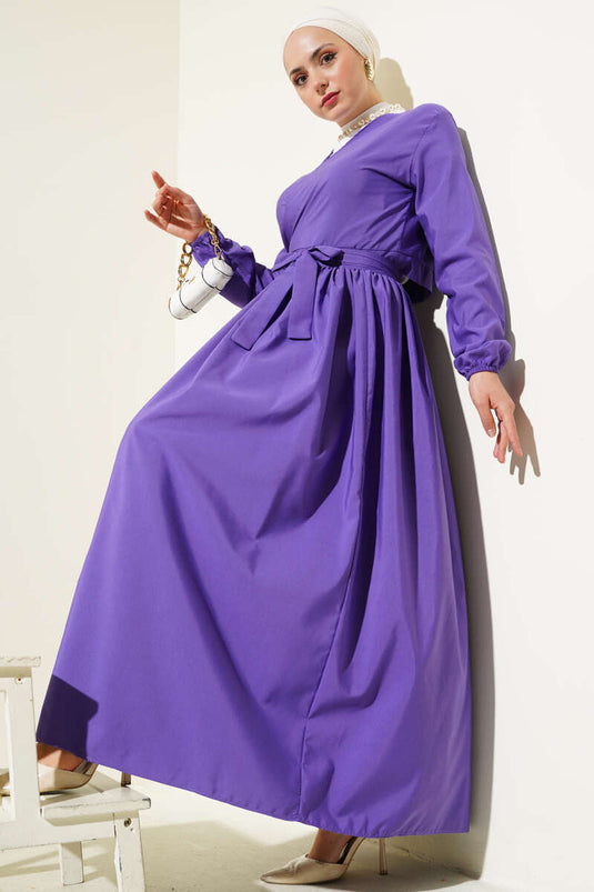 Ensemble deux pièces violet avec jupe boléro