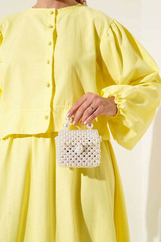 طقم من قطعتين مع تنورة مزينة بأزرار مطرزة، أصفر