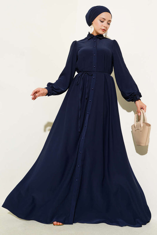 فستان أزرق داكن بحزام من الحبل وأزرار