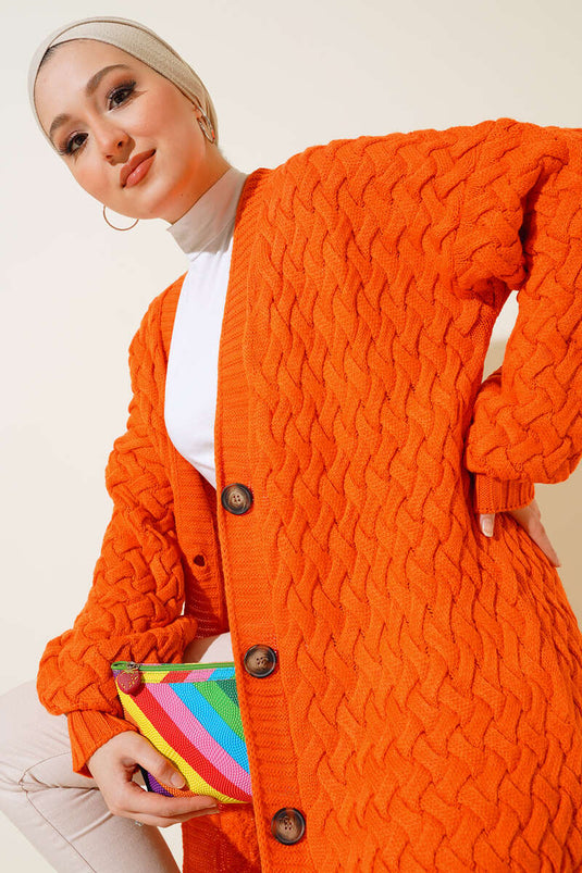 Gilet long orange en maille panier avec boutons sur toute la longueur