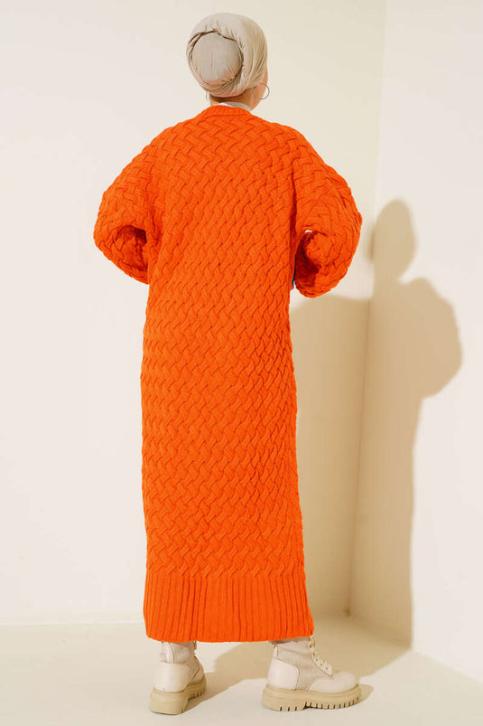 Gilet long orange en maille panier avec boutons sur toute la longueur