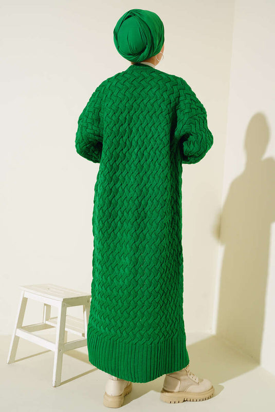 Gilet long vert en maille panier avec boutons sur le côté