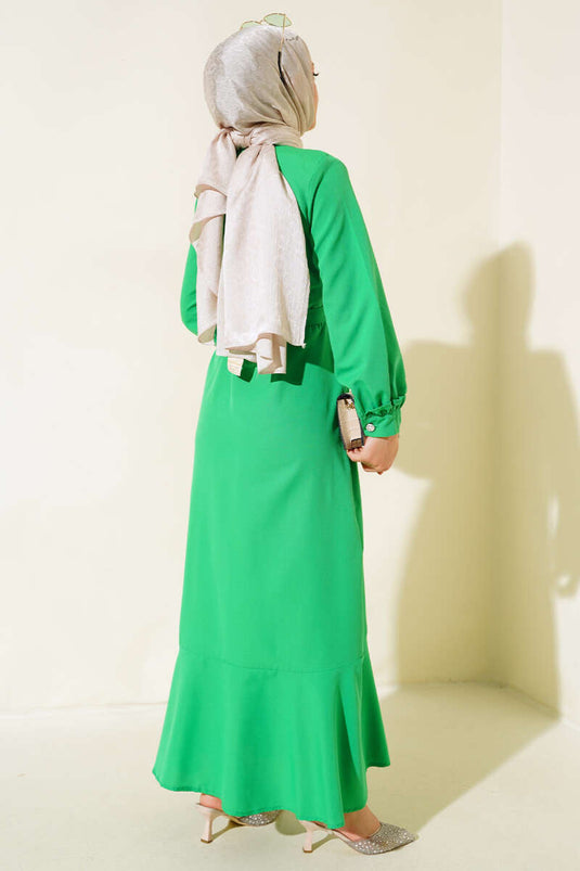 فستان كشكش بطول الأرض باللون الأخضر