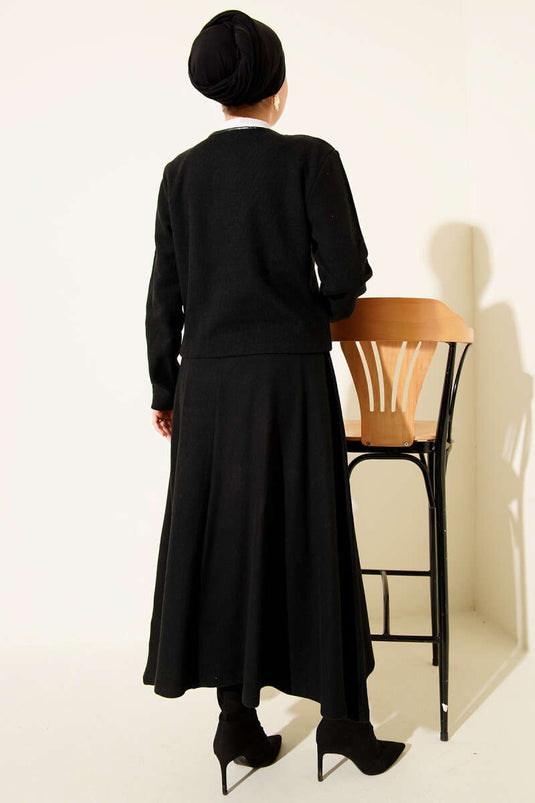 Ensemble deux pièces en velours côtelé et cachemire à boutons, noir.