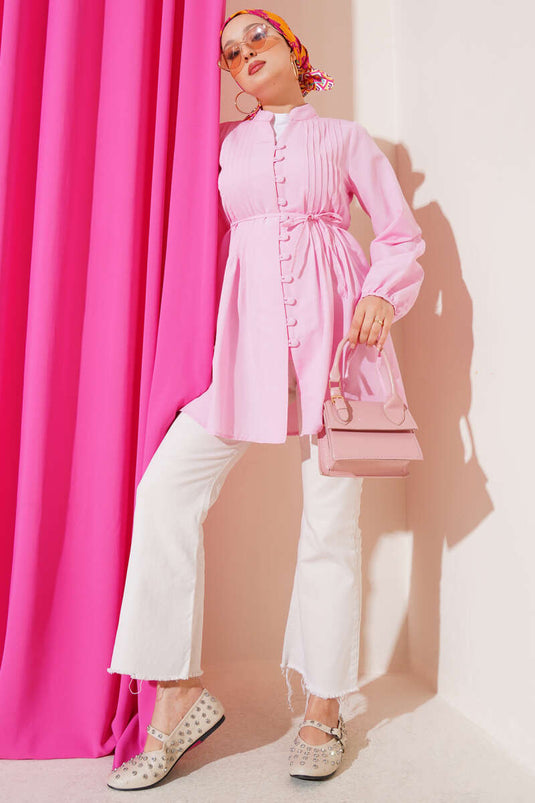 سترة وردية اللون مضلعة بأزرار بريطانية