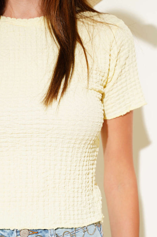 Gesneden in geel met bubbelpatroon