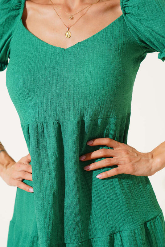 Robe verte en crêpe à manches ballon