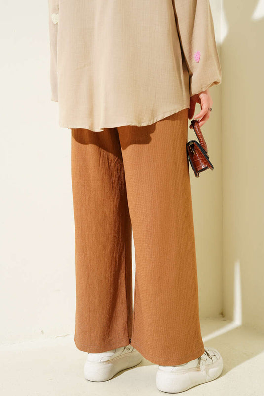 Pantalon en crêpe à taille élastique couleur latte