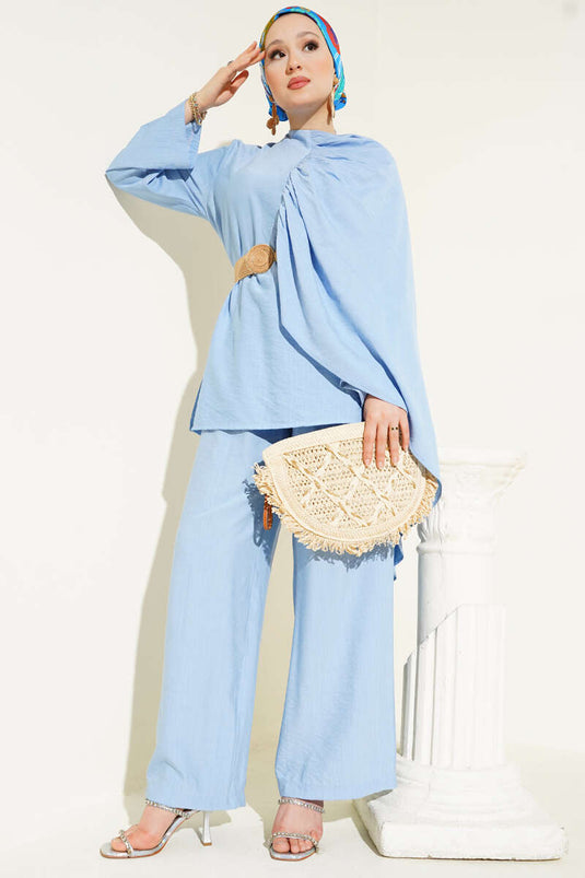 بدلة مكونة من قطعتين بغطاء للرأس وكتف مجمعة باللون الأزرق