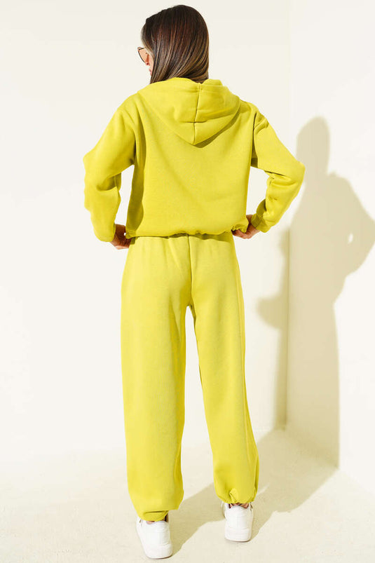 Ensemble deux pièces à capuche orné, couleur vert olive