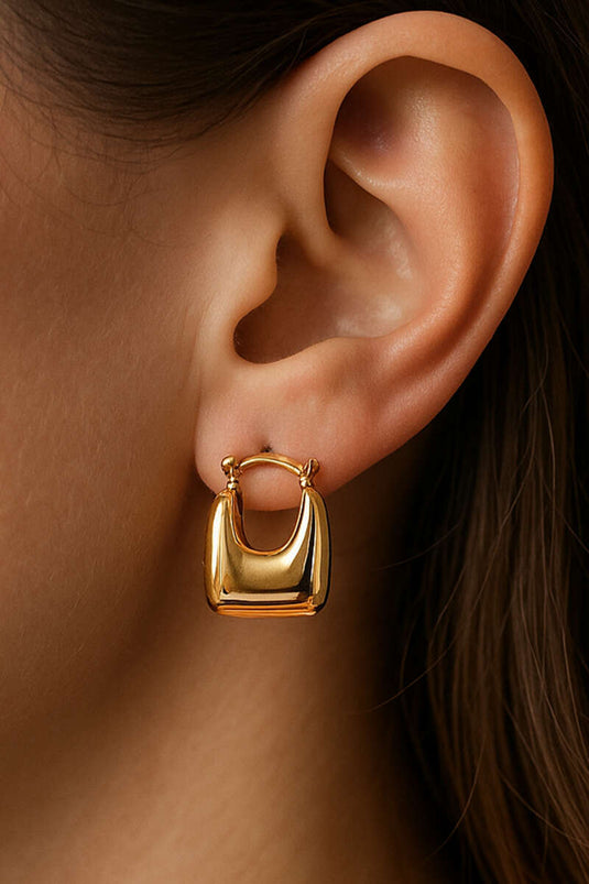 قرط على شكل حقيبة ذهبي