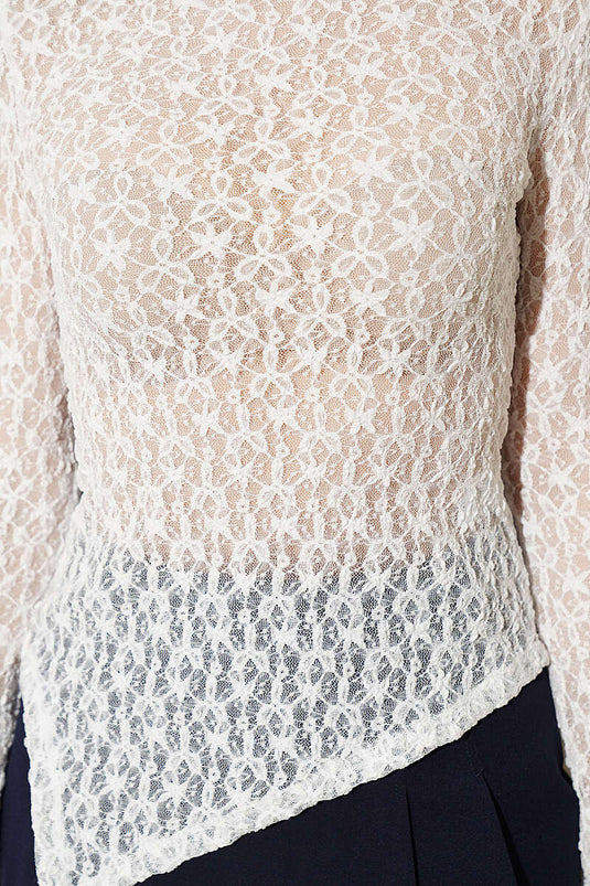 Blusa in pizzo con incrocio bianca