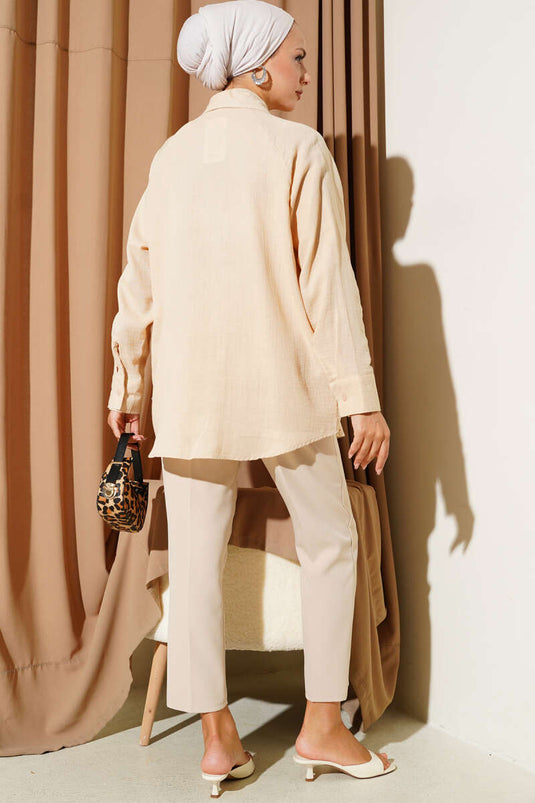 قميص موسلين بلون الجمل مع تفاصيل الجيب