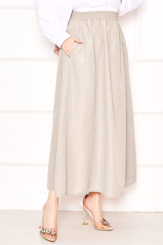 Jupe de sport en tercotton beige avec poches