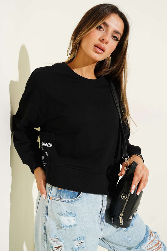 Zwarte sweater met zakdetails