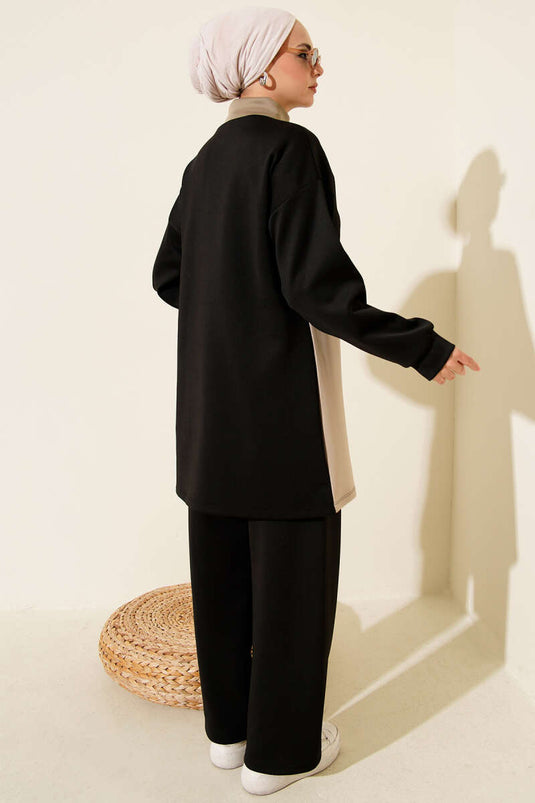 Combinaison de plongée deux pièces noire avec rabat de poche et détails soignés