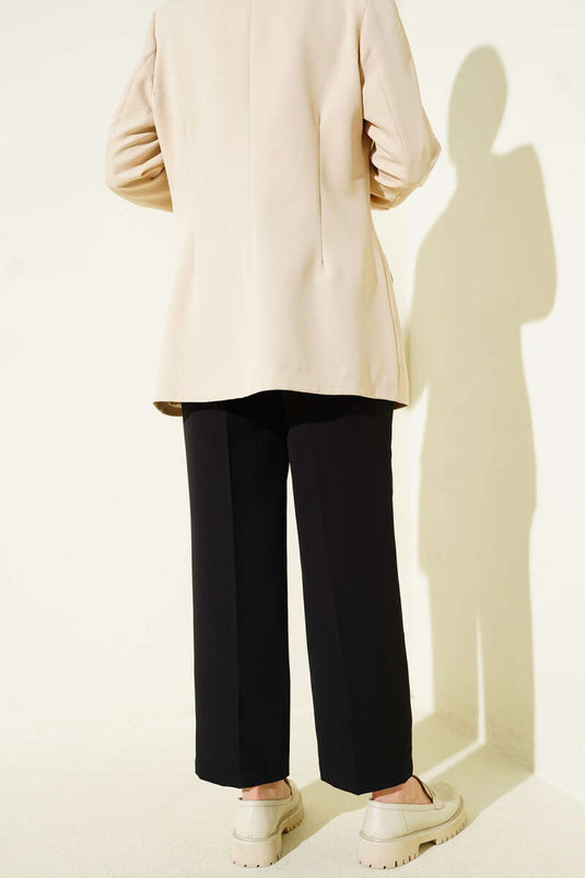 Pantalon noir à poches avec ceinture