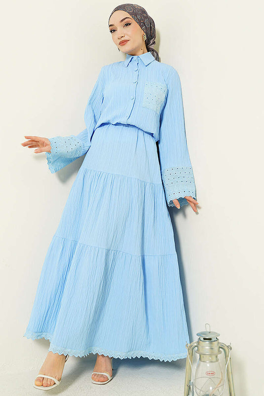 Ensemble jupe plissée brodée à poches et poignets bleu bébé