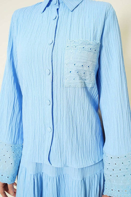 Ensemble jupe plissée brodée à poches et poignets bleu bébé