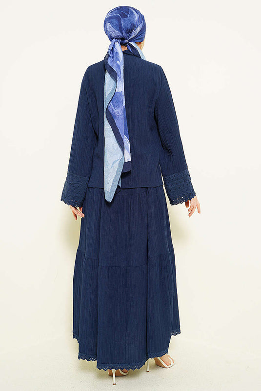 Ensemble jupe plissée brodée aux poignets et poches, bleu marine