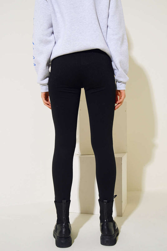 Collants noirs à poches