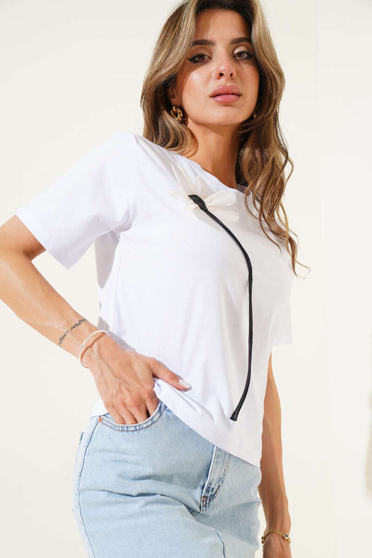 White T-Shirt with Floral Accessories