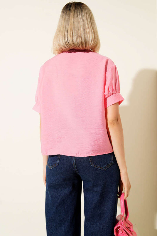 Chemise à nouer en dentelle florale rose