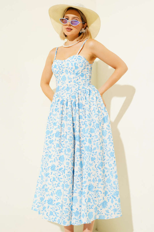 فستان ميدي أزرق بنقشة زهور وحمالات